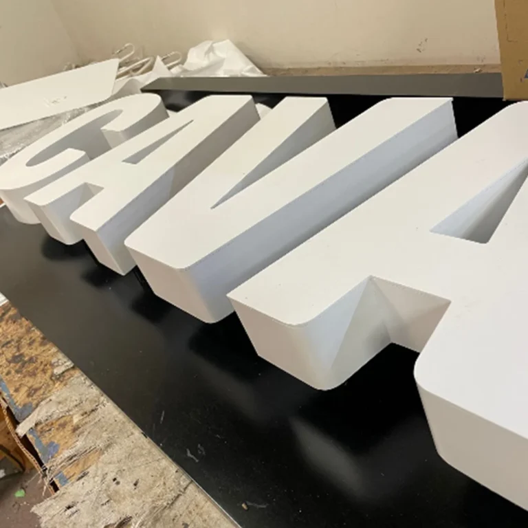 white backlit channel letters signs with black back